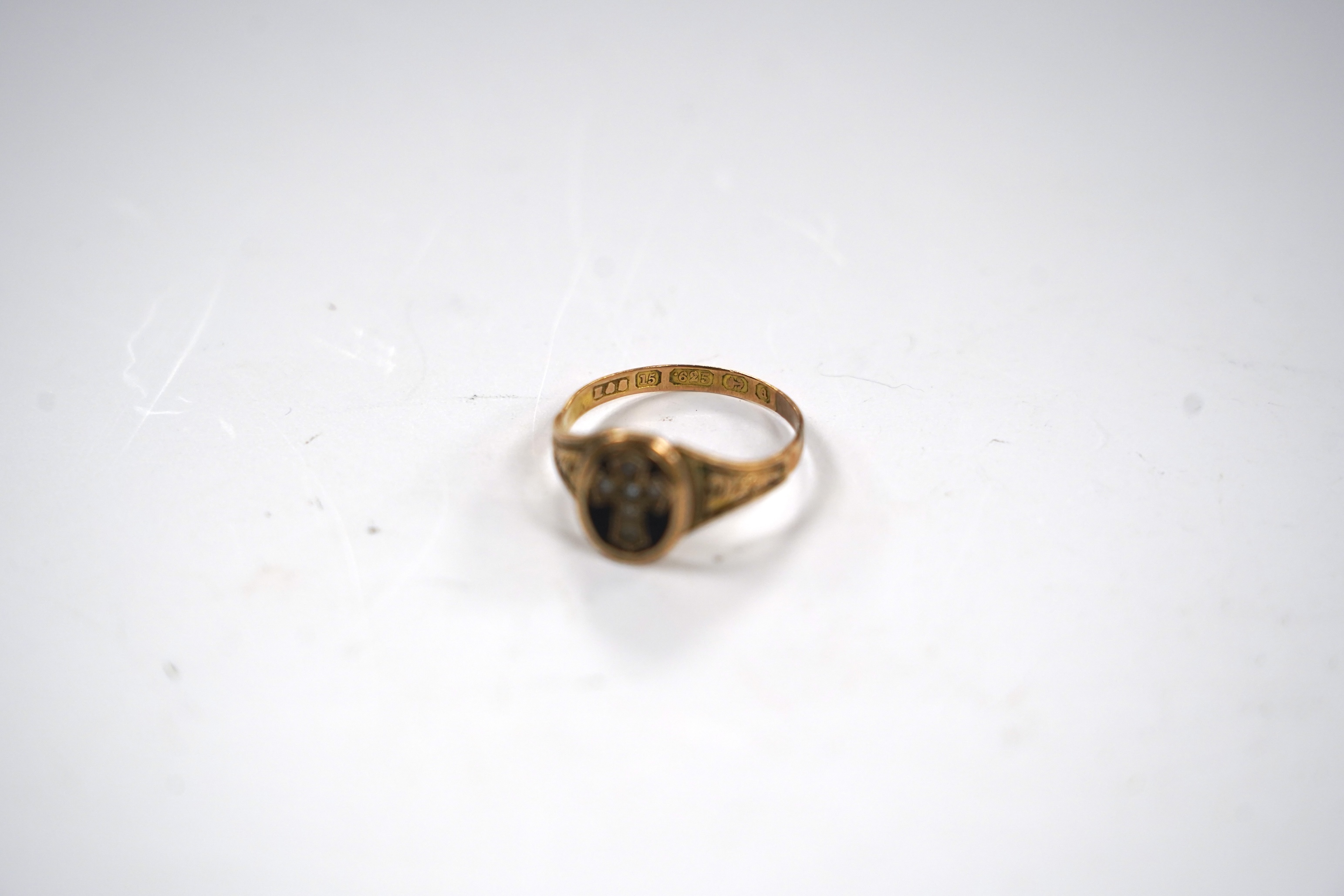 A Victorian 15ct gold black enamel and seed pearl set mourning ring, size Q, gross weight 2.3 grams.